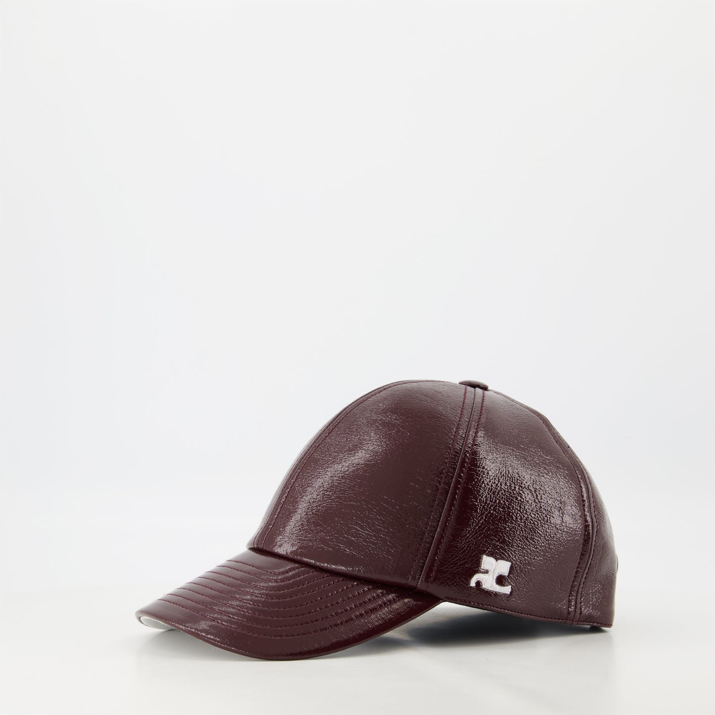 Courrèges cap, burgundy vinyl, adjustable cap, unisex fashion, embossed logo