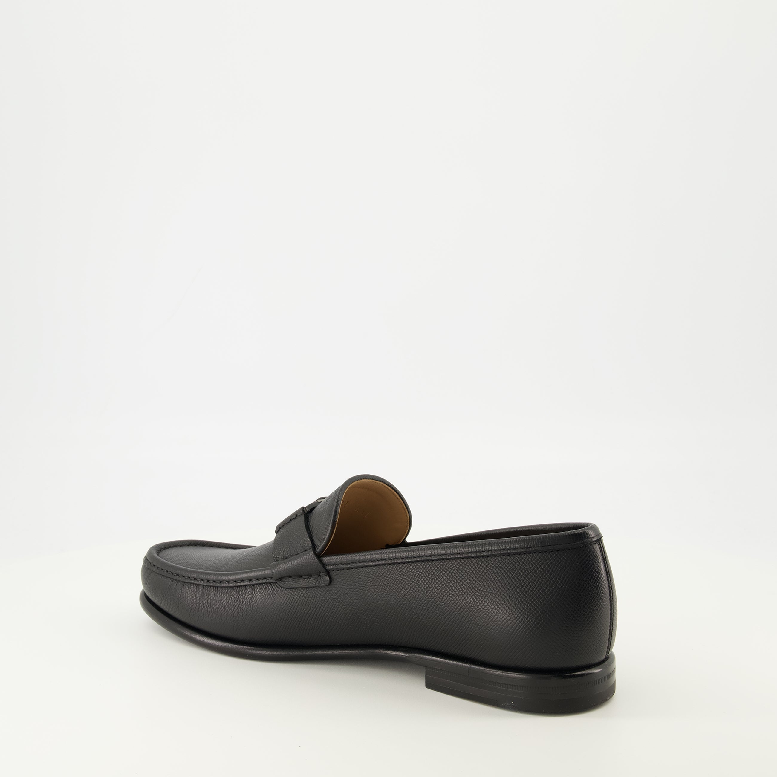Image of Black Leather Loafers by Ferragamo for Men - Season Spring-Summer 2026 - Back Right Three-Quarter View