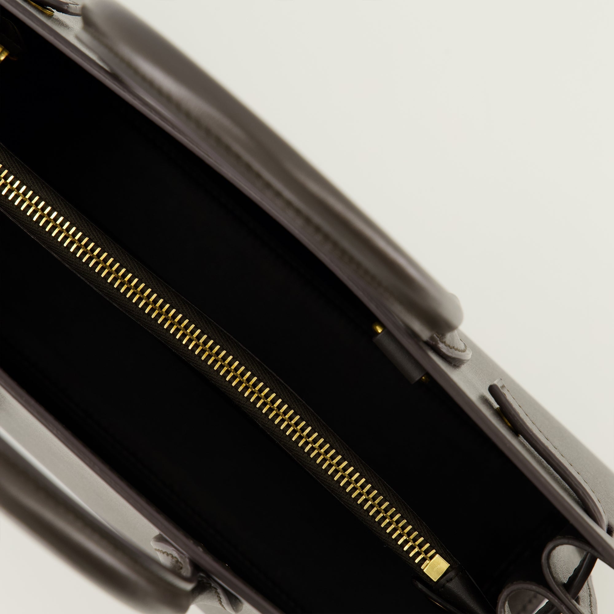 brown leather handbag, Saint Laurent bag, high-quality handbag, elegant handbag, structured handbag