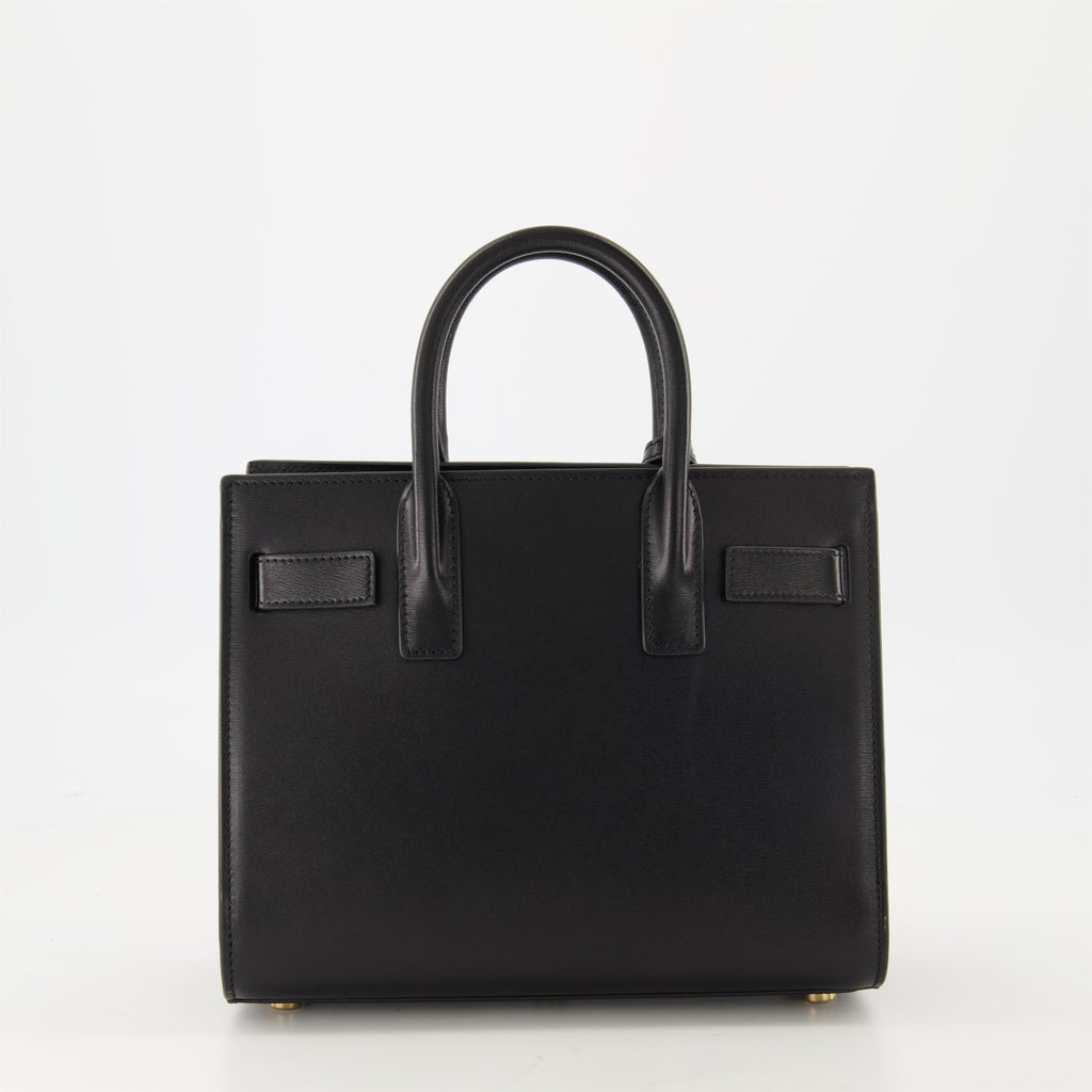 black leather bag, Saint Laurent bag, designer handbags, autumn winter collection, adjustable shoulder bag