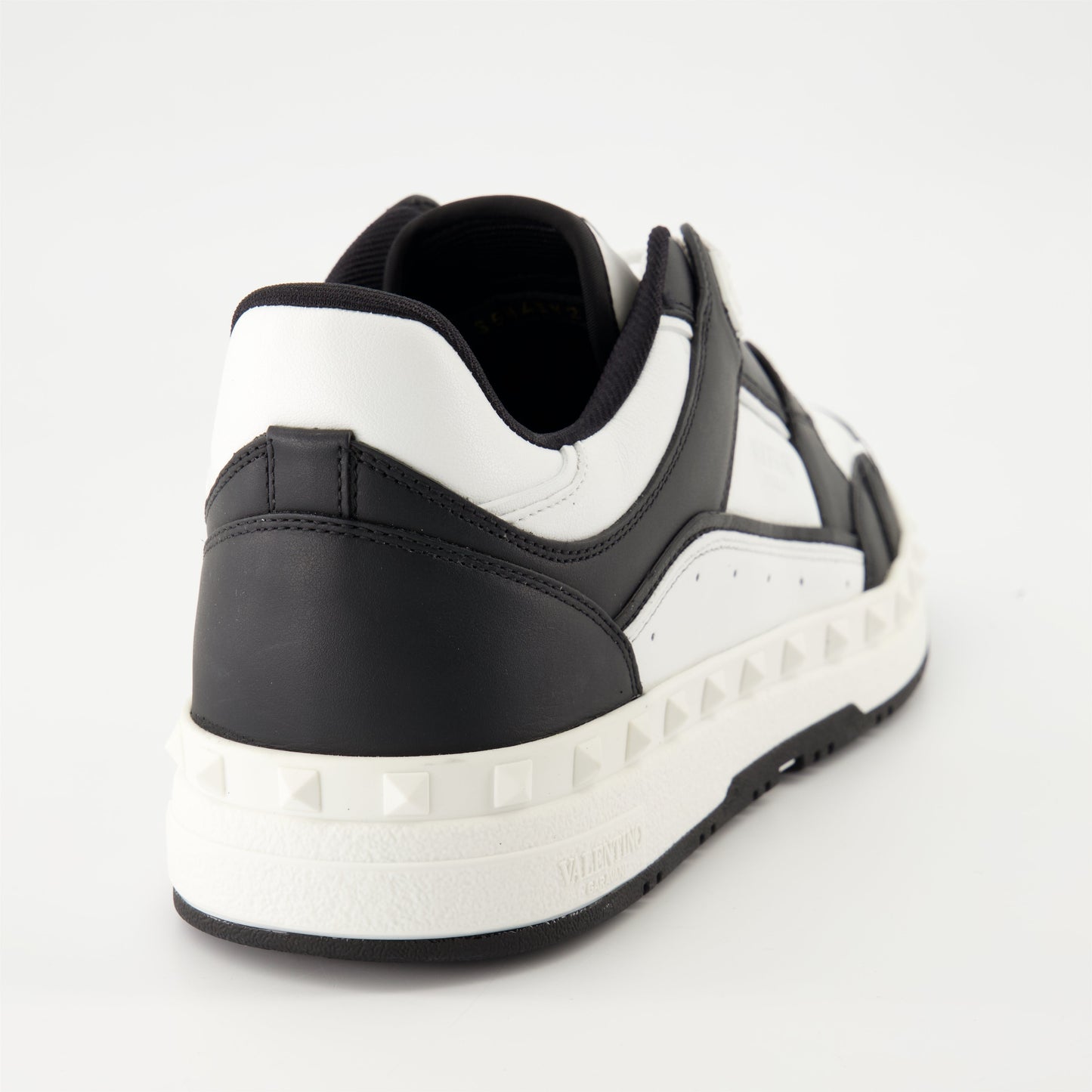 Valentino Garavani sneakers, black and white leather sneakers, luxury footwear, designer sneakers, high-end fashion