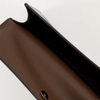 VLogo pouch, textured leather, Valentino Garavani, luxury accessories, wrist strap