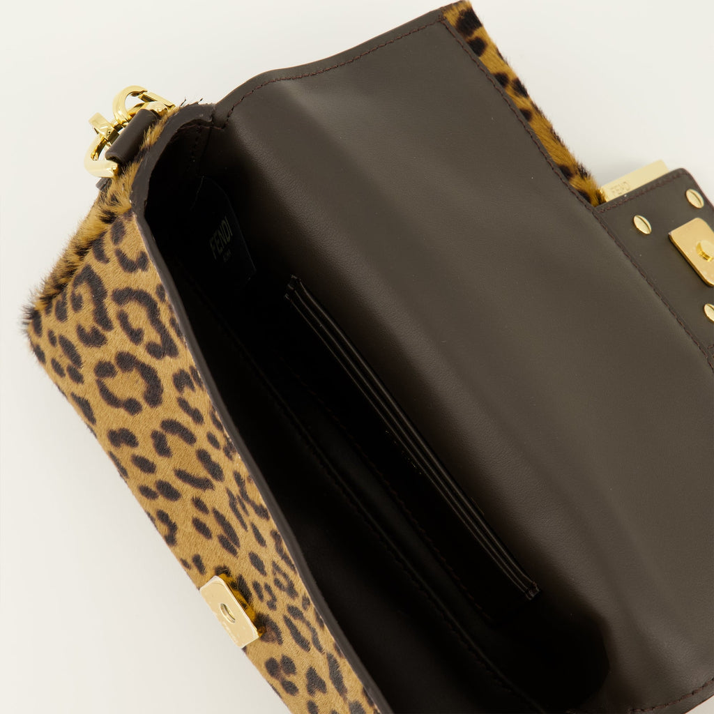 Fendi baguette bag, leopard print accessory, luxury handbag, detachable strap, calf leather bag