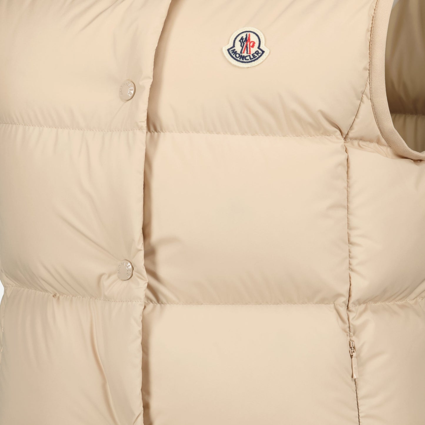 sleeveless puffer, beige puffer, Moncler vest, quilted design, foldable outerwear