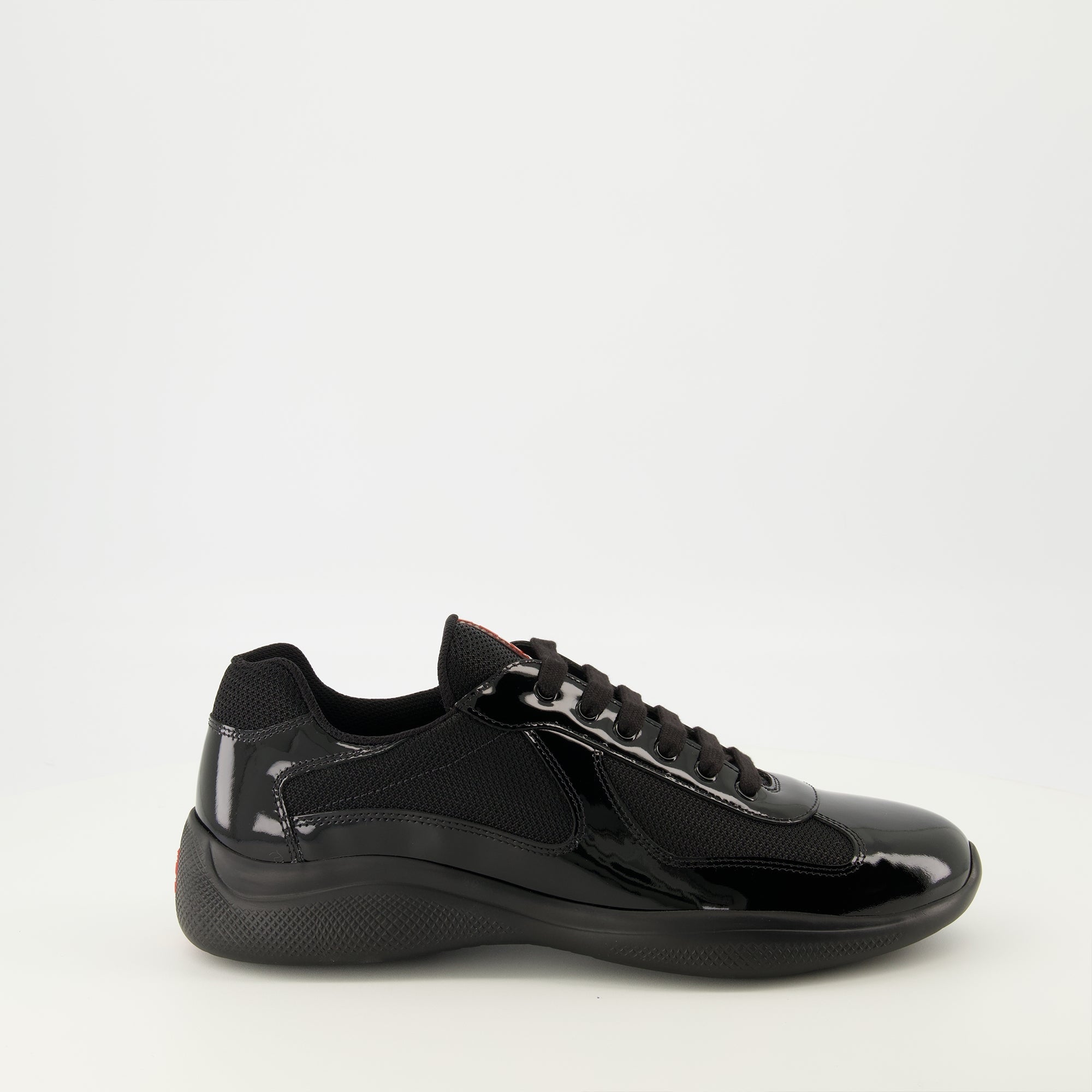 Prada sneakers, black calfskin shoes, sporty footwear, luxury lifestyle, designer sneakers