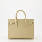 beige day bag, Saint Laurent bag, grained leather bag, designer accessories, elegant handbag