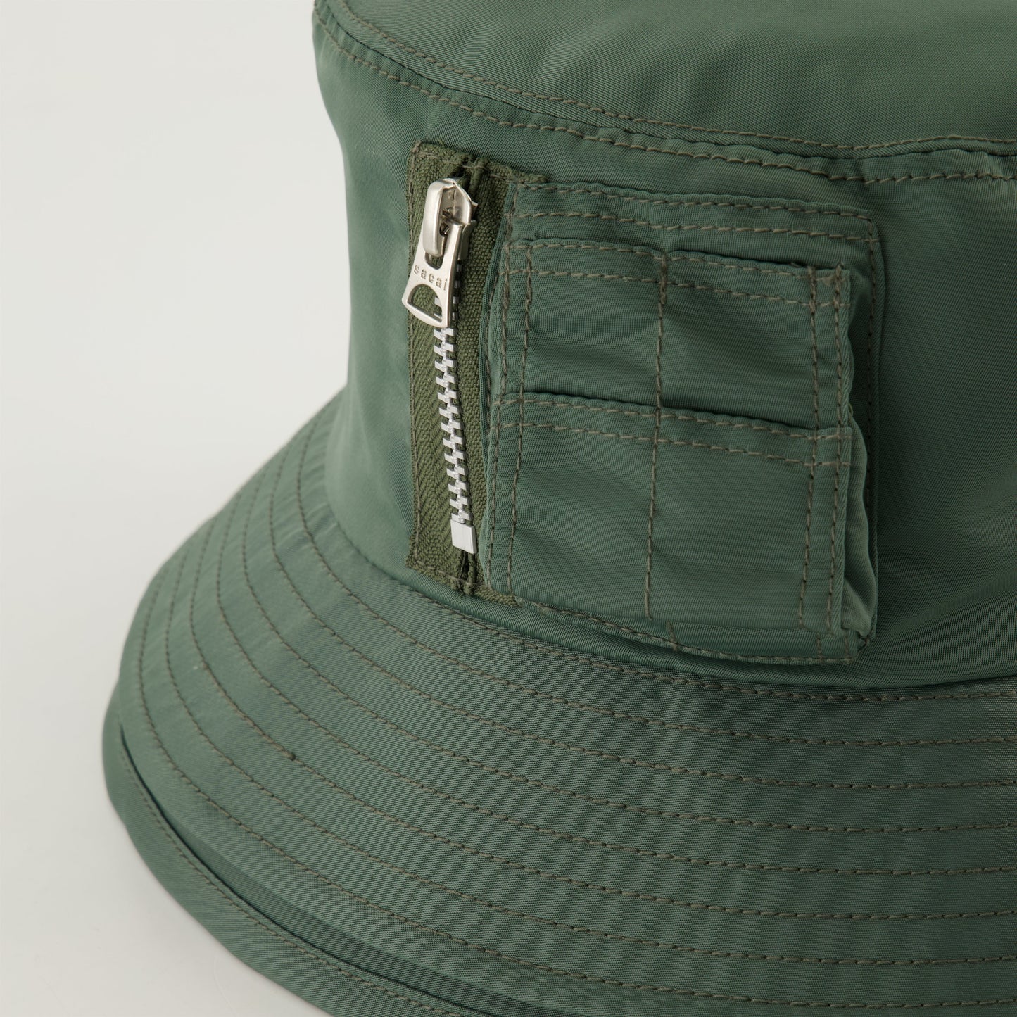 Green bucket hat, Sacai bucket hat, embroidered logo hat, layered design hat, seasonal accessories