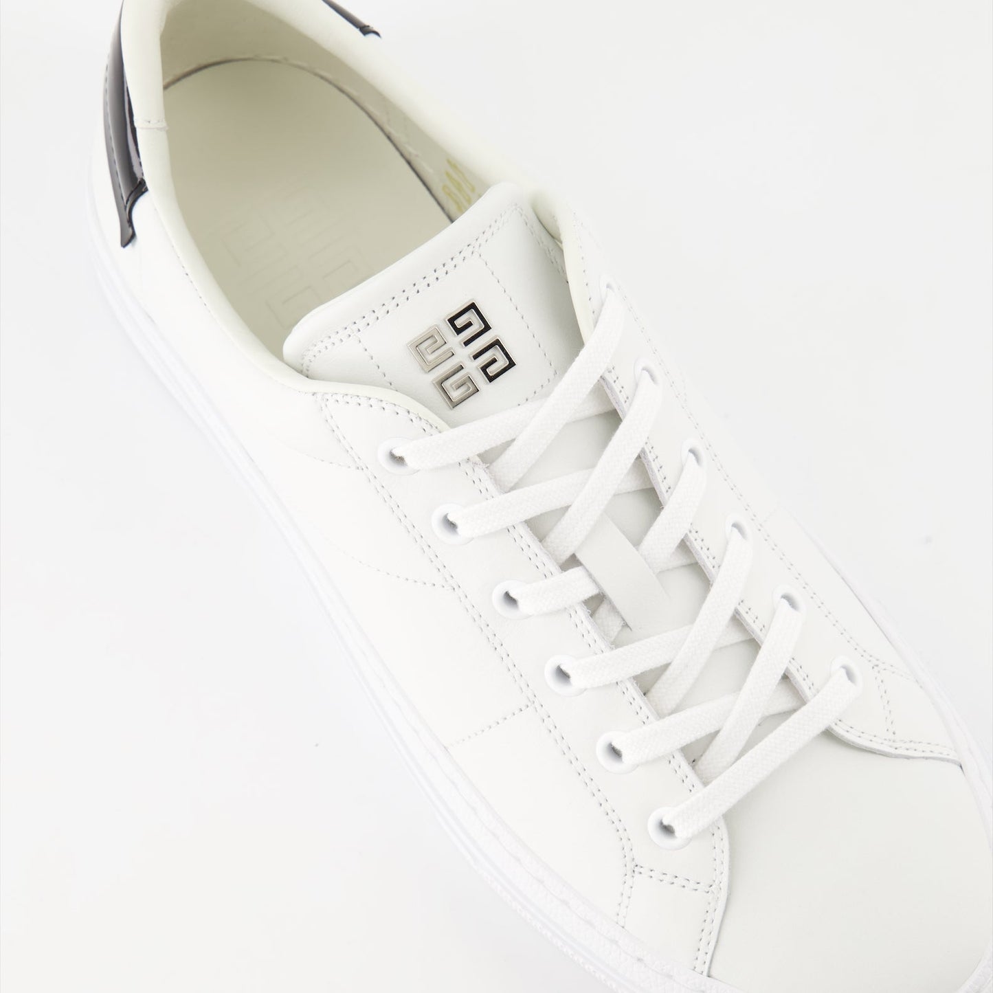 luxury sneakers, Givenchy sneakers, white leather sneakers, designer footwear, high-end shoes