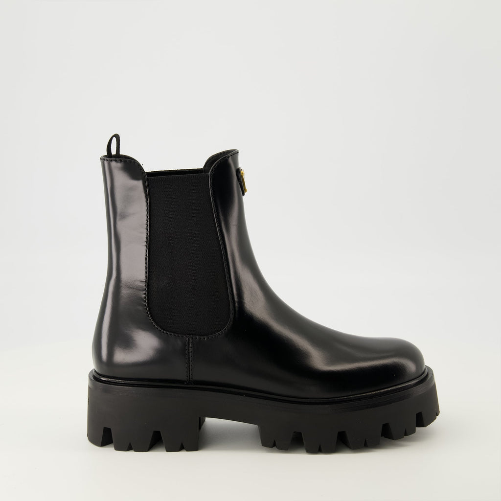 Prada ankle boots, black leather boots, Autumn-Winter 2025, slip-on design, rubber tread sole