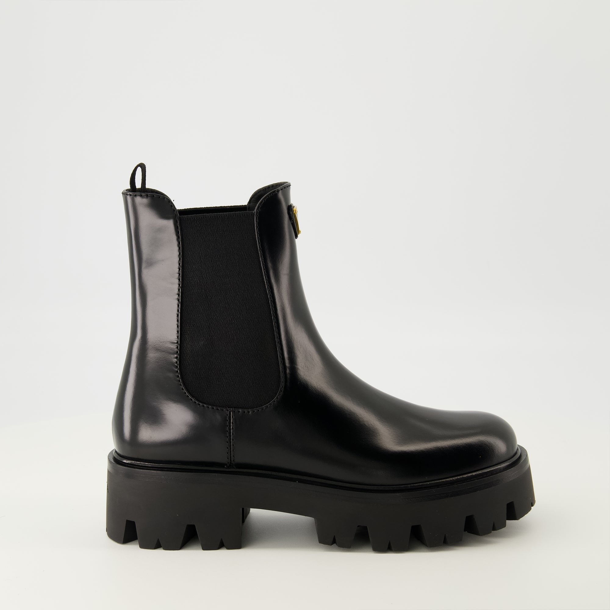 Prada ankle boots, black leather boots, Autumn-Winter 2025, slip-on design, rubber tread sole