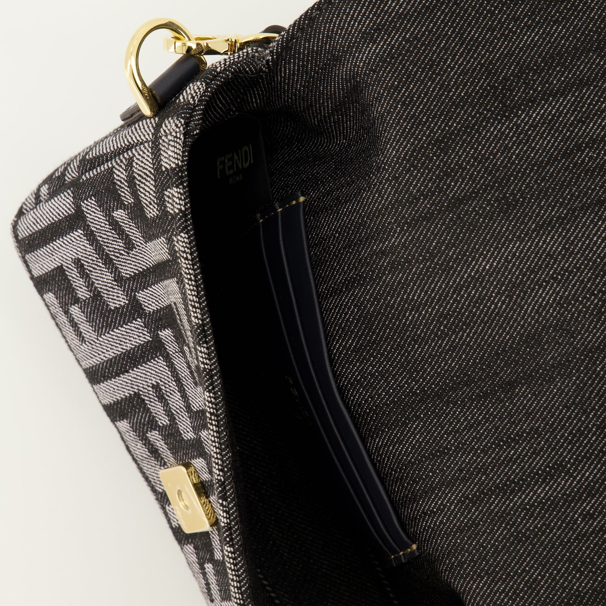 Fendi baguette bag, mini denim bag, luxury accessories, designer handbags, 2025 fashion collection