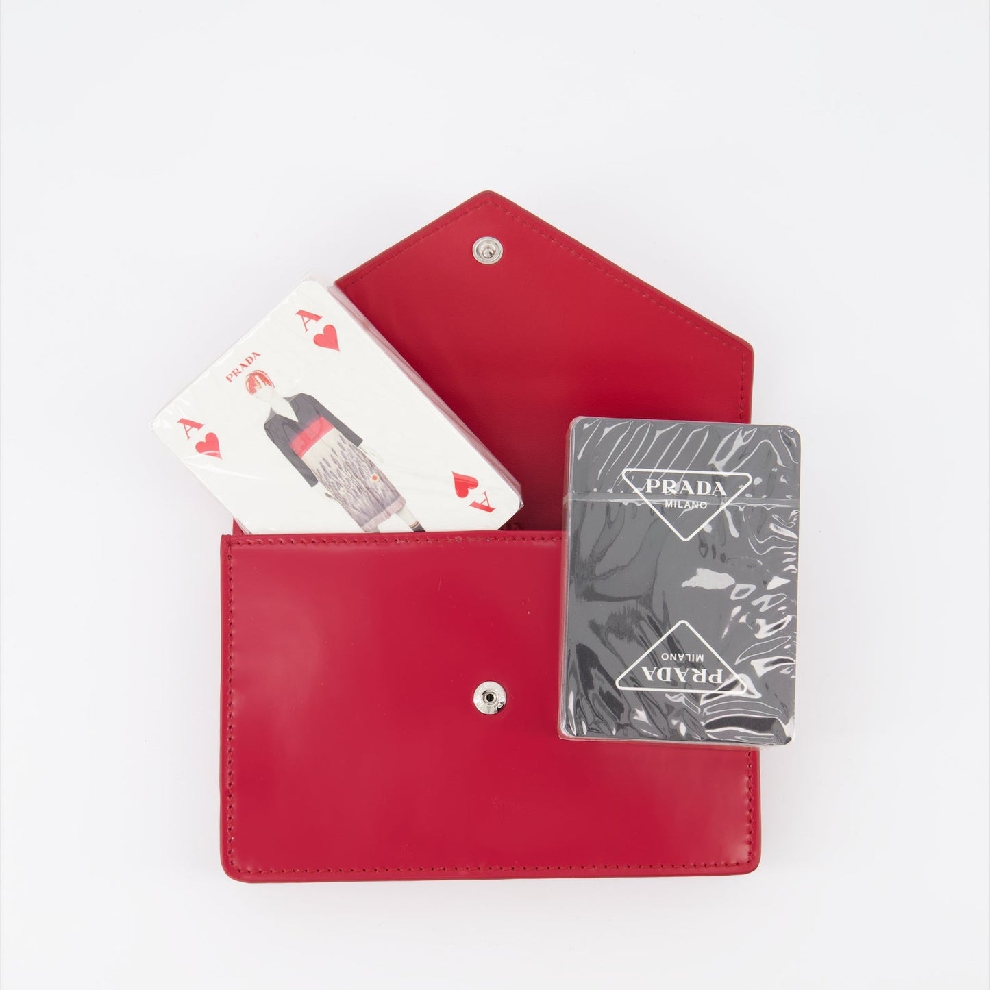 Prada playing cards, luxury leather case, high-end craftsmanship, sophisticated design, luxury accessories