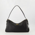 Prada, Sac Aimée, black leather bag, luxury accessories, contemporary design