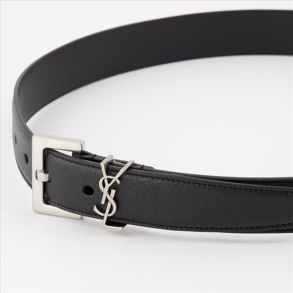black leather belt, YSL logo buckle, adjustable fit belt, sophisticated accessories, refined leather belt
