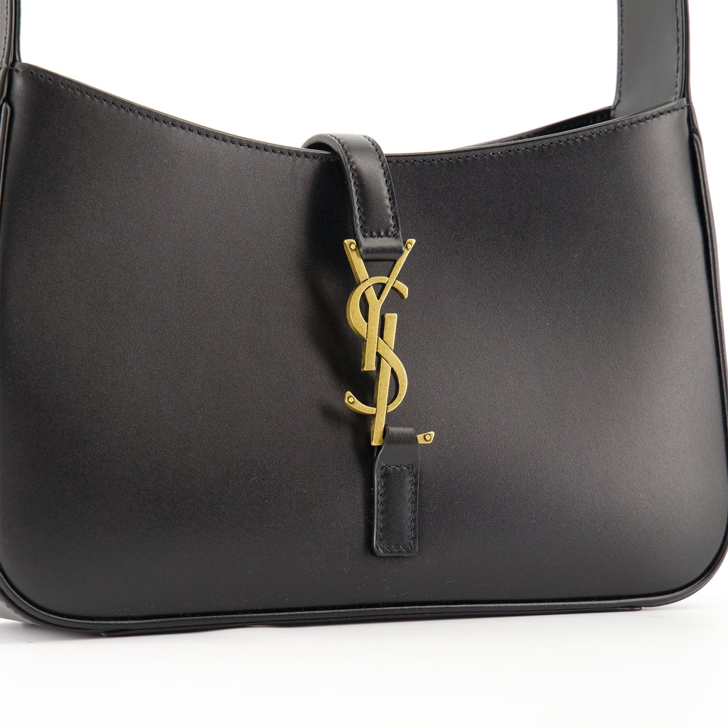 Saint Laurent bag, black leather bag, luxury accessories, designer handbag, fashion essentials