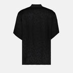 Immagine di camicia oversize in seta di Saint Laurent per uomo - Collezione Primavera-Estate 2023 - Vista del dettaglio del prodotto 1