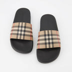 - Burberry Men's Slides
- Vintage Style
- Retro Trend
- Classic Check
- Summer Comfort