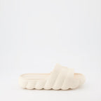 Moncler slides, luxury women's footwear, white slides, high-end fashion slides, designer casual shoes