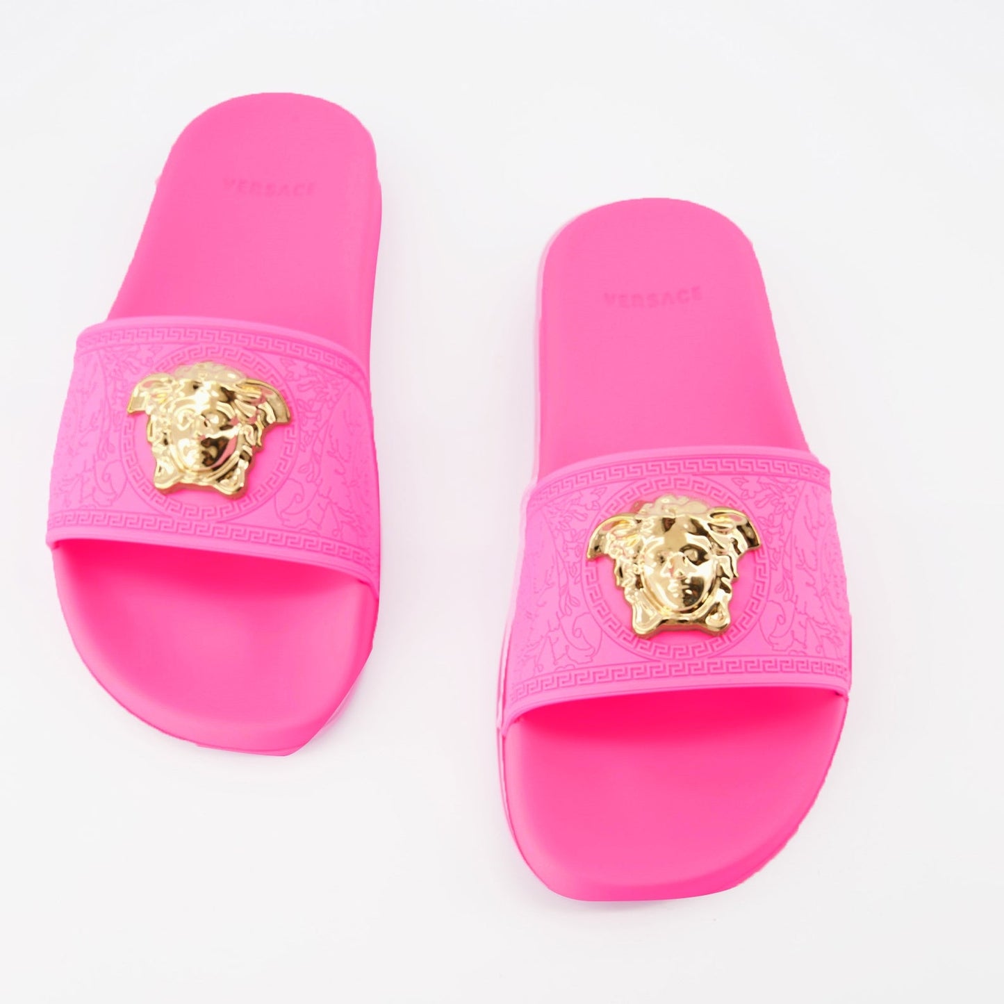 Versace slides, luxury footwear, designer slides, fuchsia slides, Medusa logo