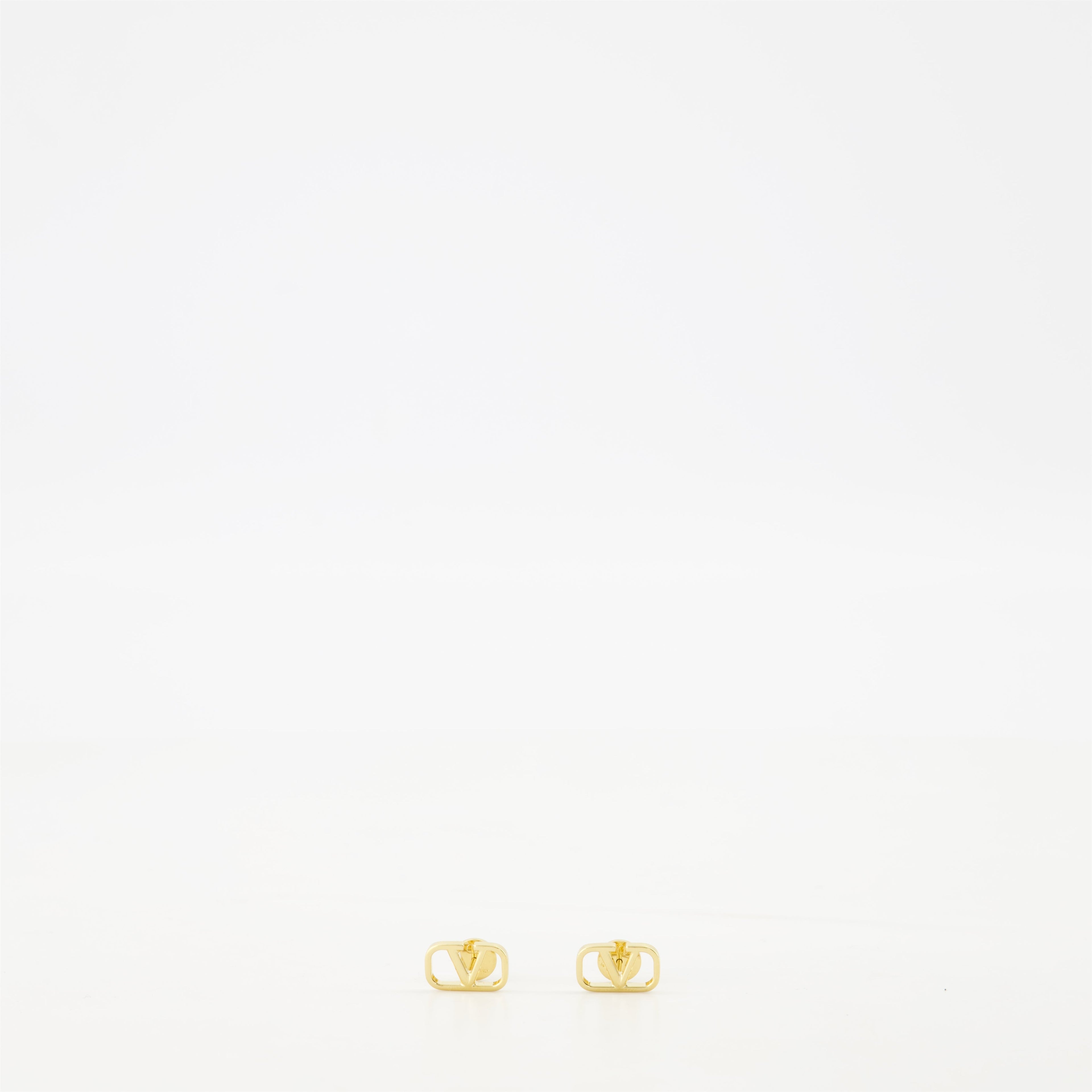 VLogo earrings, Valentino Garavani, golden stud earrings, metal earrings, luxury accessories