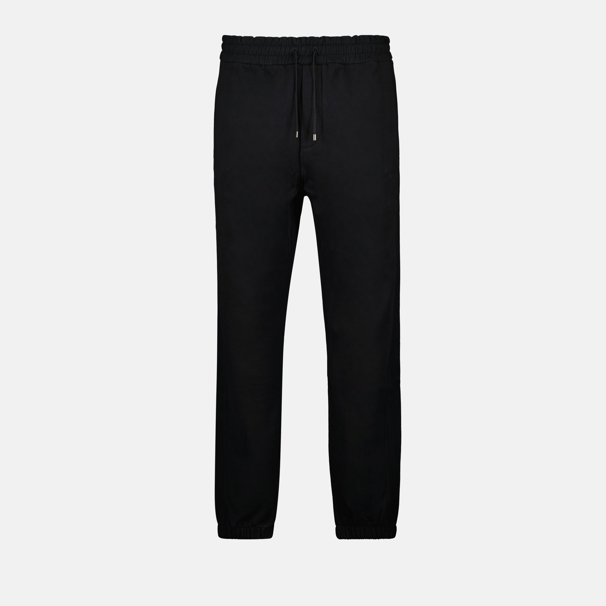 Image of Black Cotton Jogger Pants by Saint Laurent for Men - Season Autumn-Winter 2024 - Front View