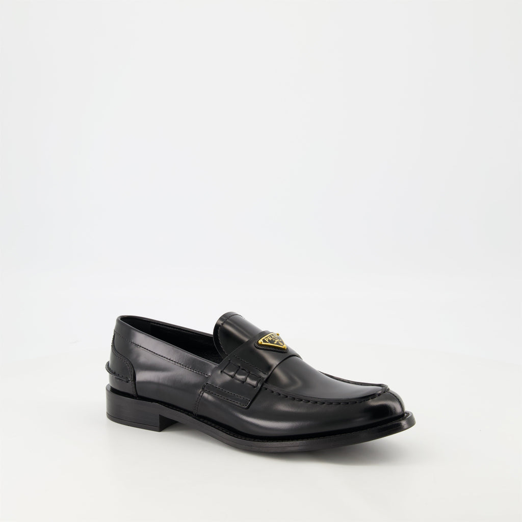 black leather moccasins, Prada footwear, brushed leather shoes, designer slip-ons, stylish moccasins