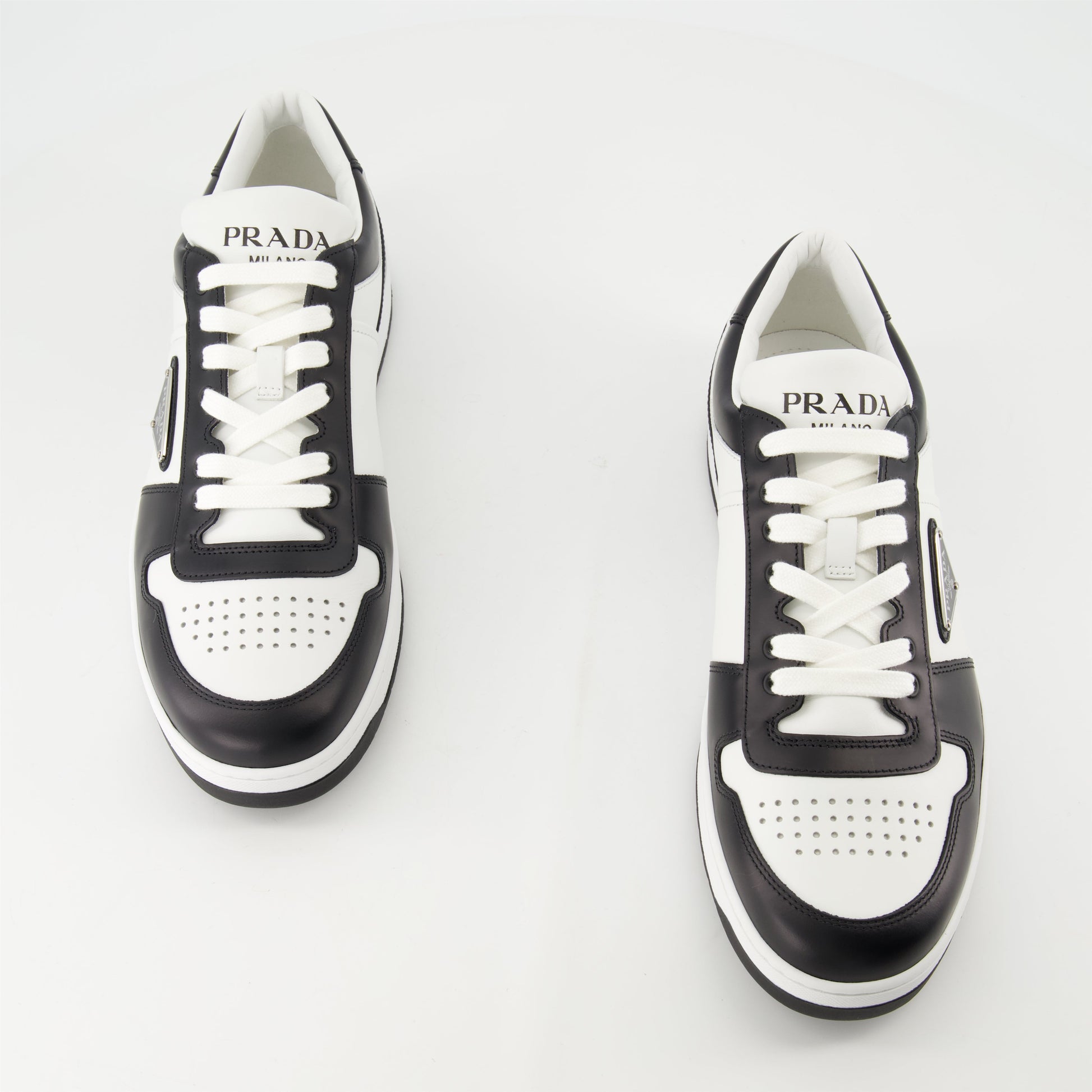 leather sneakers, black and white, Prada, rubber sole, triangle logo