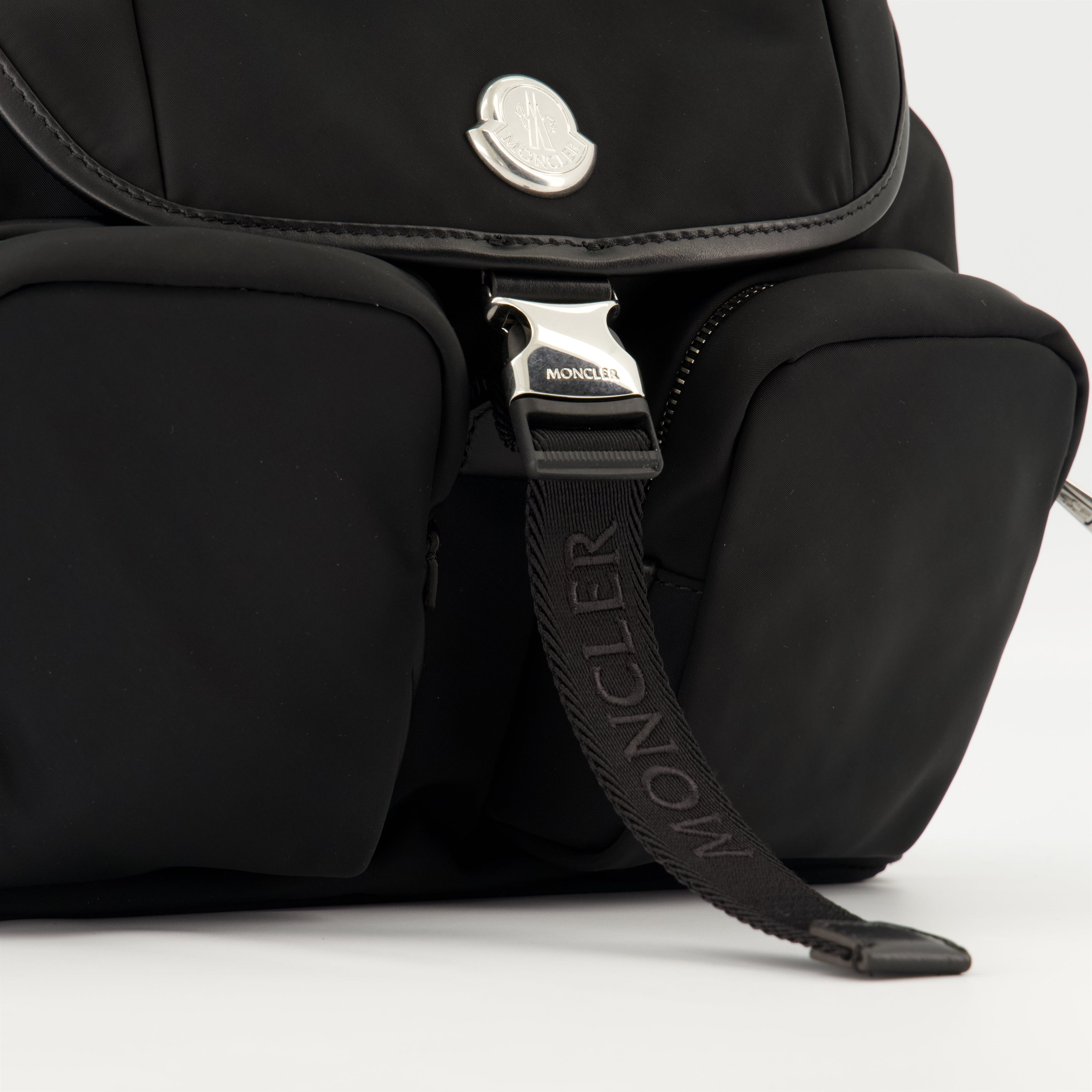 Moncler backpack, waterproof design, luxury accessories, functional fashion, stylish bags