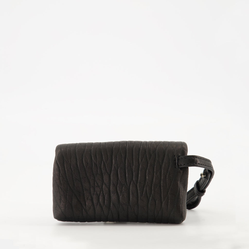 Cassandre envelope, Saint Laurent accessory, black leather bag, luxury clutch, grained leather