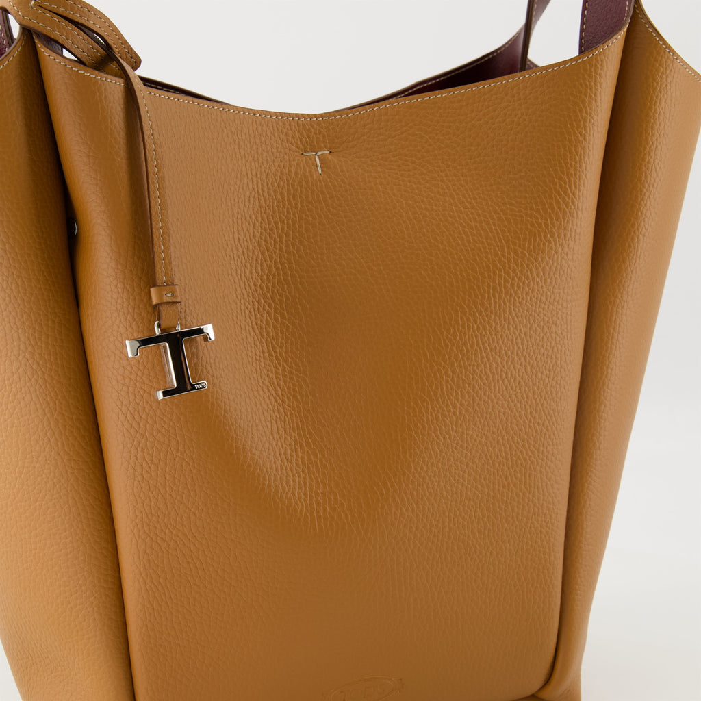 brown leather bucket bag, Tod's bag, luxury accessories, designer handbag, camel leather bag