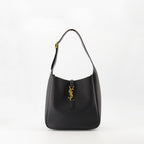 black leather bag, Saint Laurent, grained leather, elegant handbag, adjustable strap