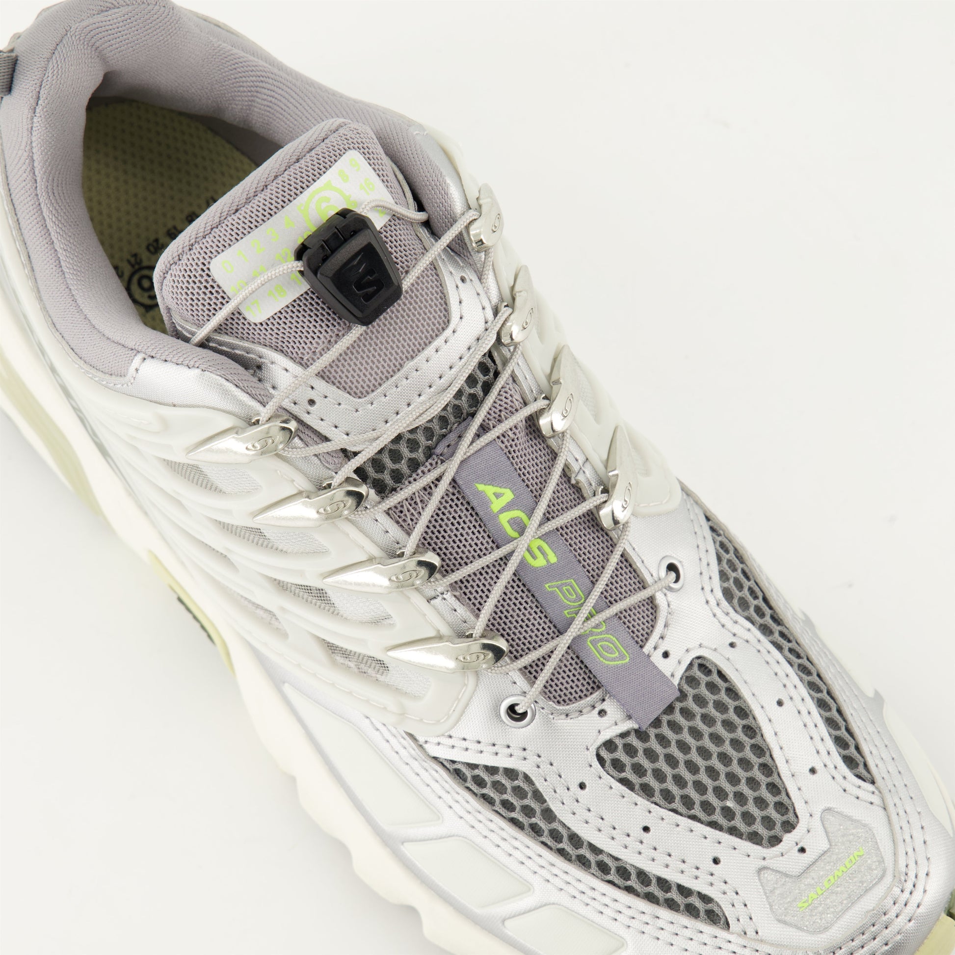 MM6 sneakers, Salomon collaboration, silver athletic shoes, stylish sneakers, designer footwear