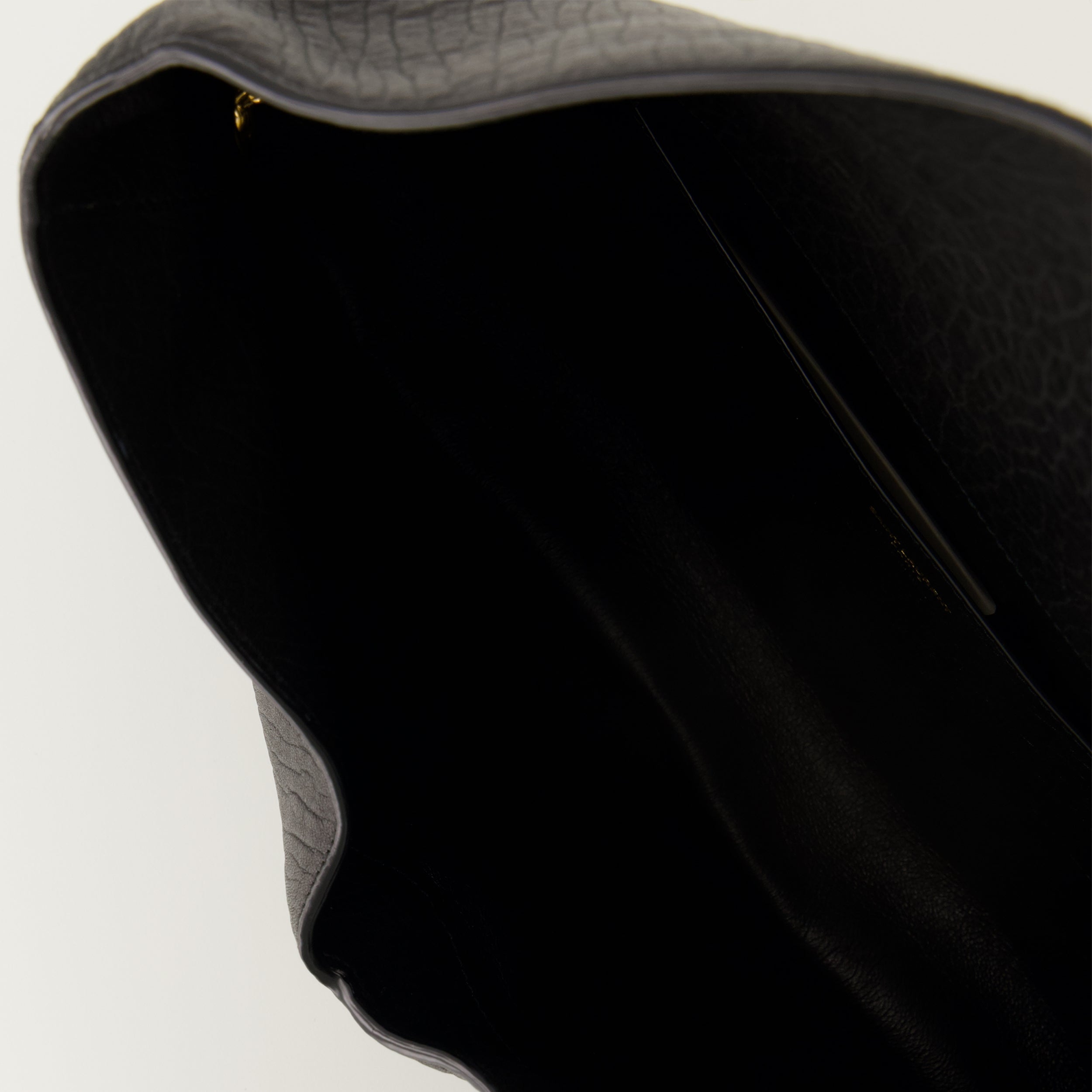 Saint Laurent clutch, black lambskin bag, Cassandre XXL, luxury leather accessory, designer clutch