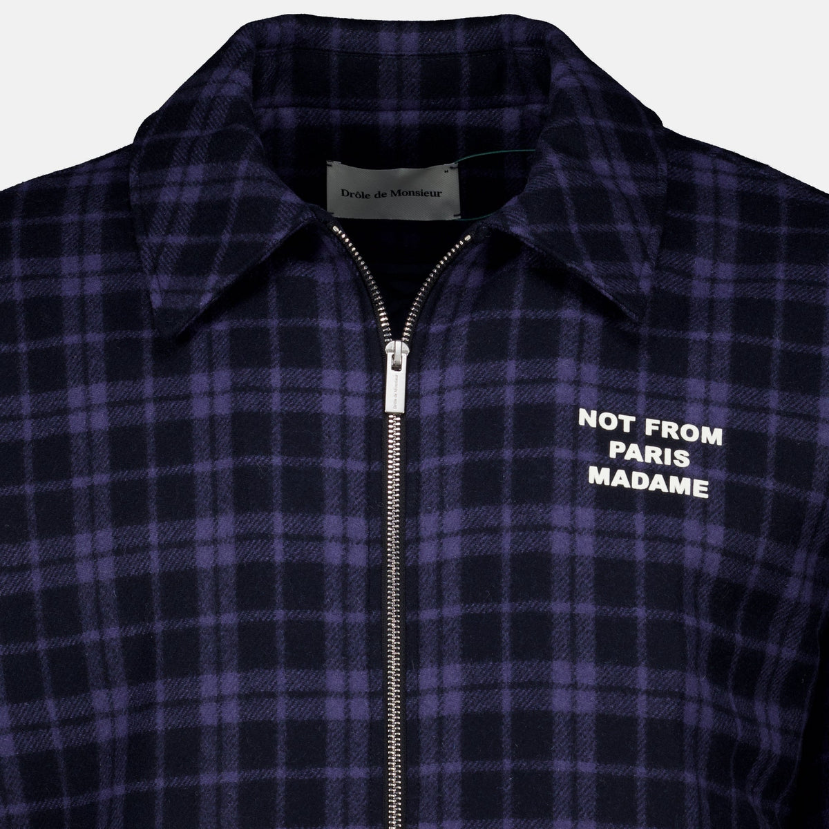 Chaqueta de franela a cuadros azul marino con eslogan