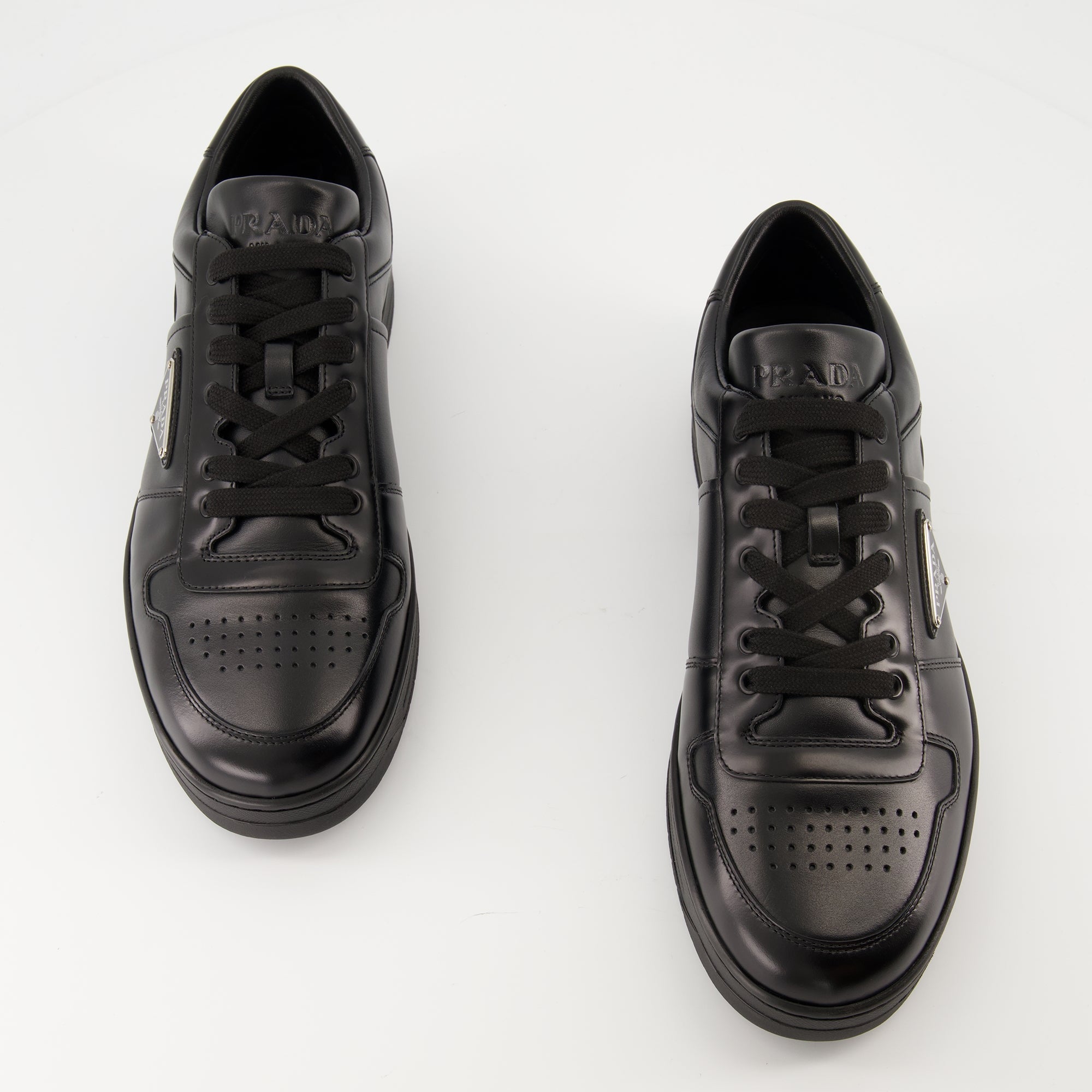 Prada baskets, black leather sneakers, luxury footwear, Autumn-Winter collection, designer shoes