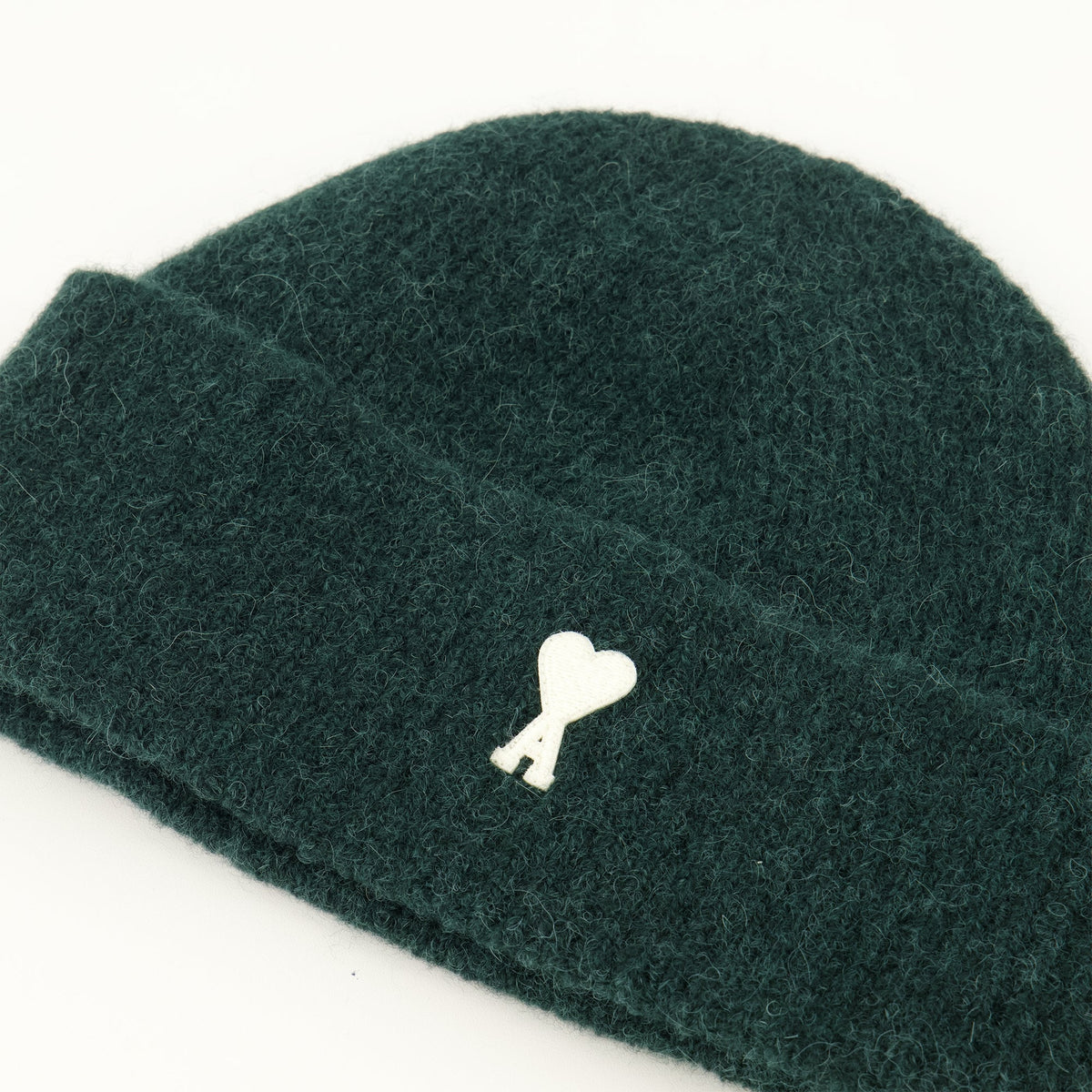 Berretto verde in maglia di alpaca