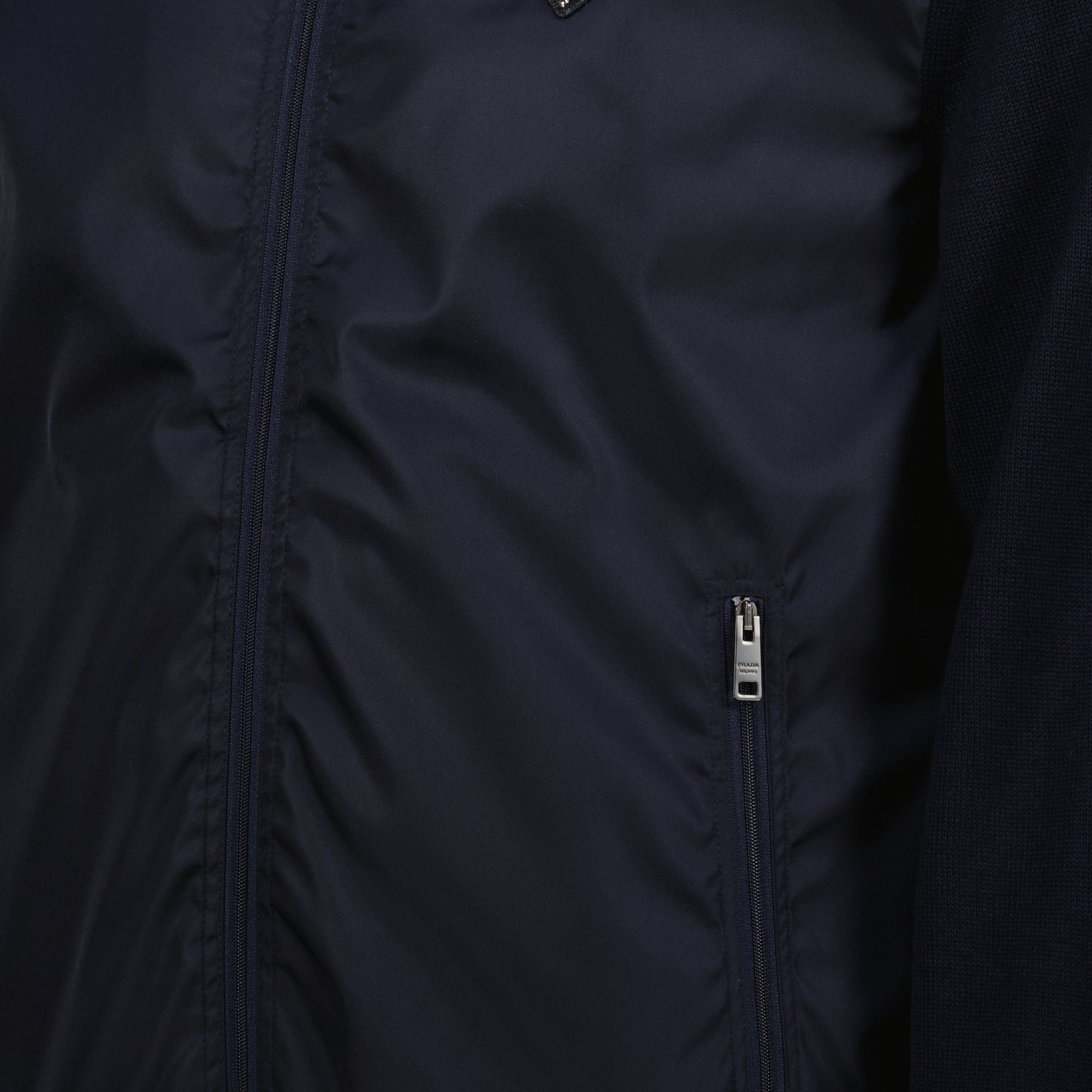 Prada jacket, navy bi-material jacket, recycled materials outerwear, high collar jacket, Autumn-Winter 2025 collection