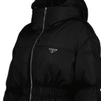 Prada puffer jacket, Re-Nylon jacket, black cinched jacket, sustainable outerwear, luxury winter jacket