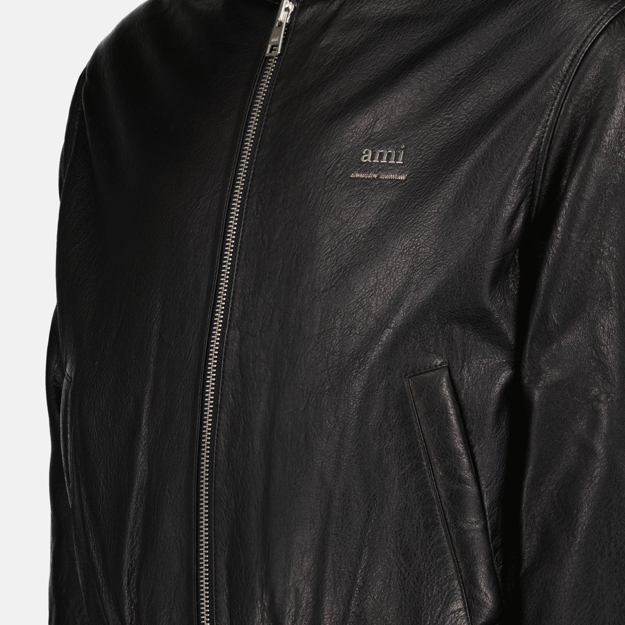 Image of Black Leather Bomber Jacket by Ami PARIS for Men - Season Autumn-Winter 2024 - Detail View 5