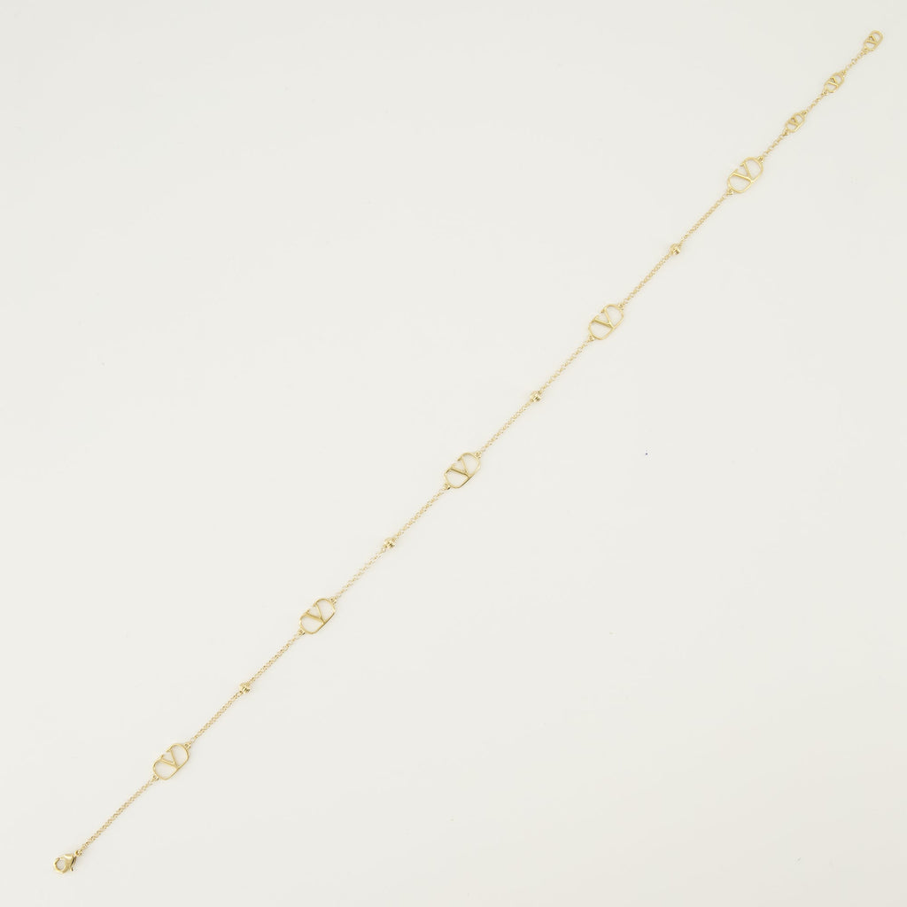 バレンティノ・ガラヴァーニの女性用Vlogoゴールドネックレスの画像 - 2026年春夏シーズン - 詳細ビュー1