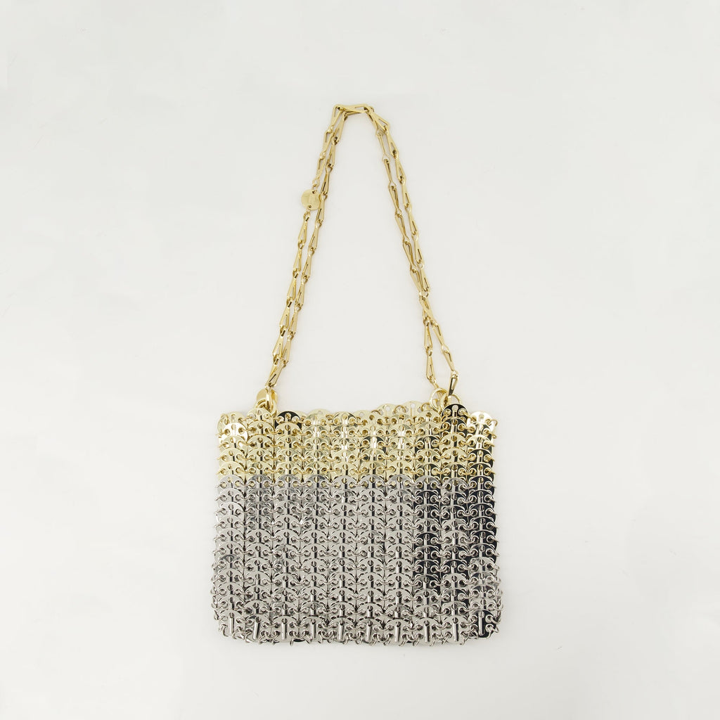 silver shoulder bag, Iconic Skyline 1969, designer handbag, sophisticated accessories, women's fashion