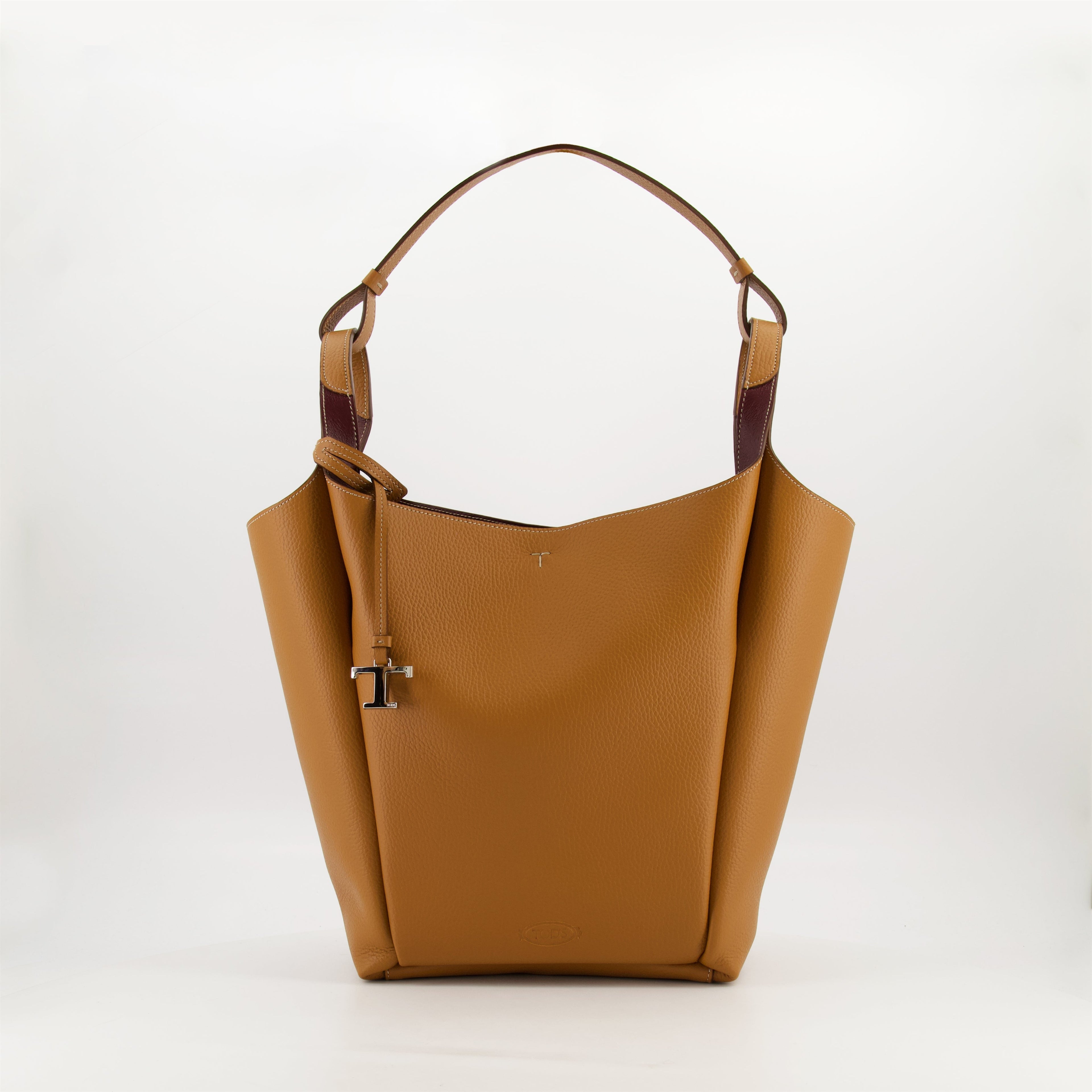 brown leather bucket bag, Tod's bag, luxury accessories, designer handbag, camel leather bag