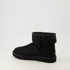 Image of Classic Mini II Black Suede Boots by Ugg for Women - Season Autumn-Winter 2025 - Back Right Three-Quarter View