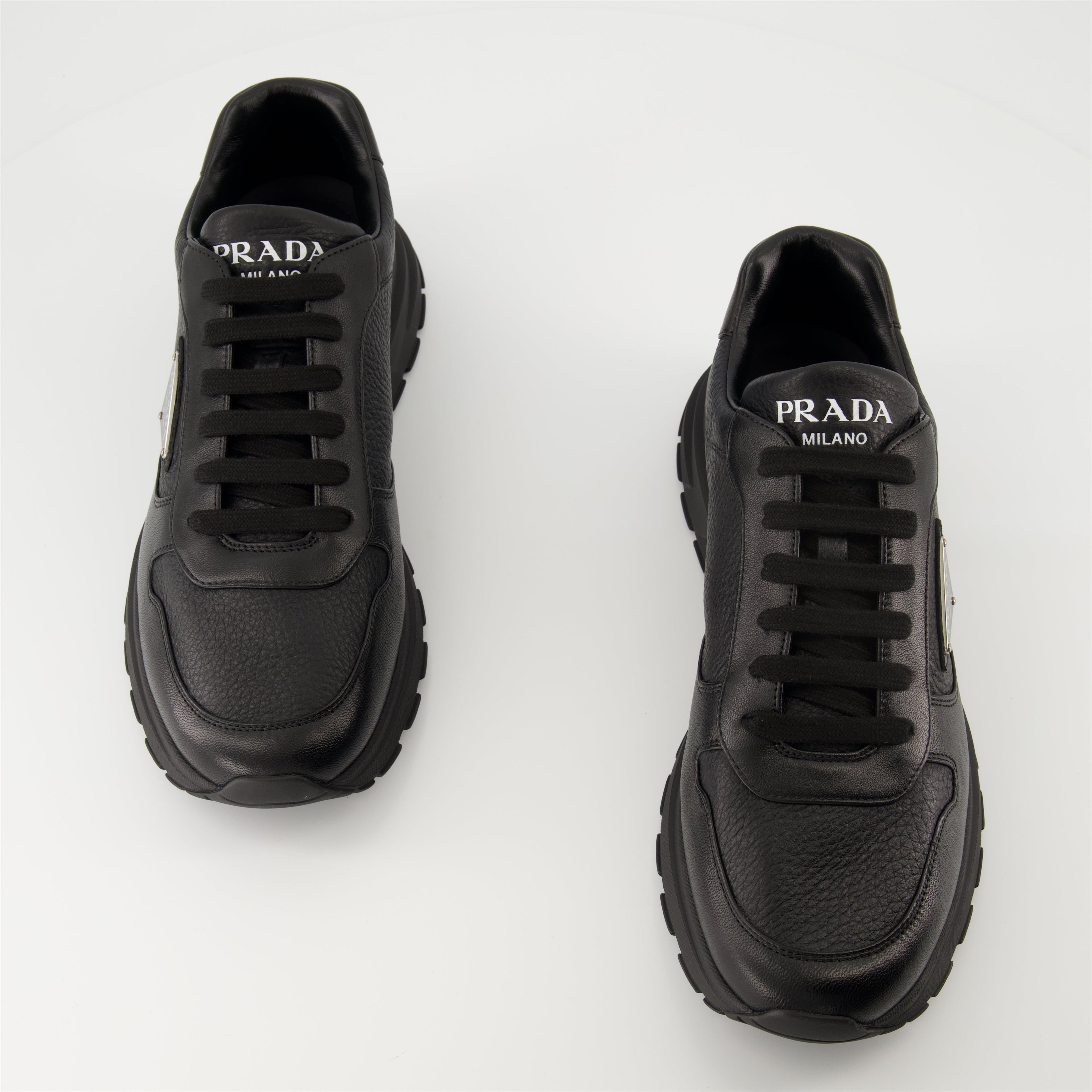 Prada sneakers, black leather sneakers, Prax 01 model, men's footwear, luxury menswear