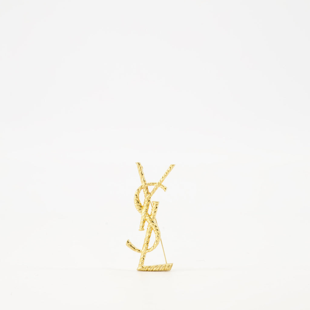 Cassandre brooch, Saint Laurent accessory, gold brooch, metal logo, fashion jewelry