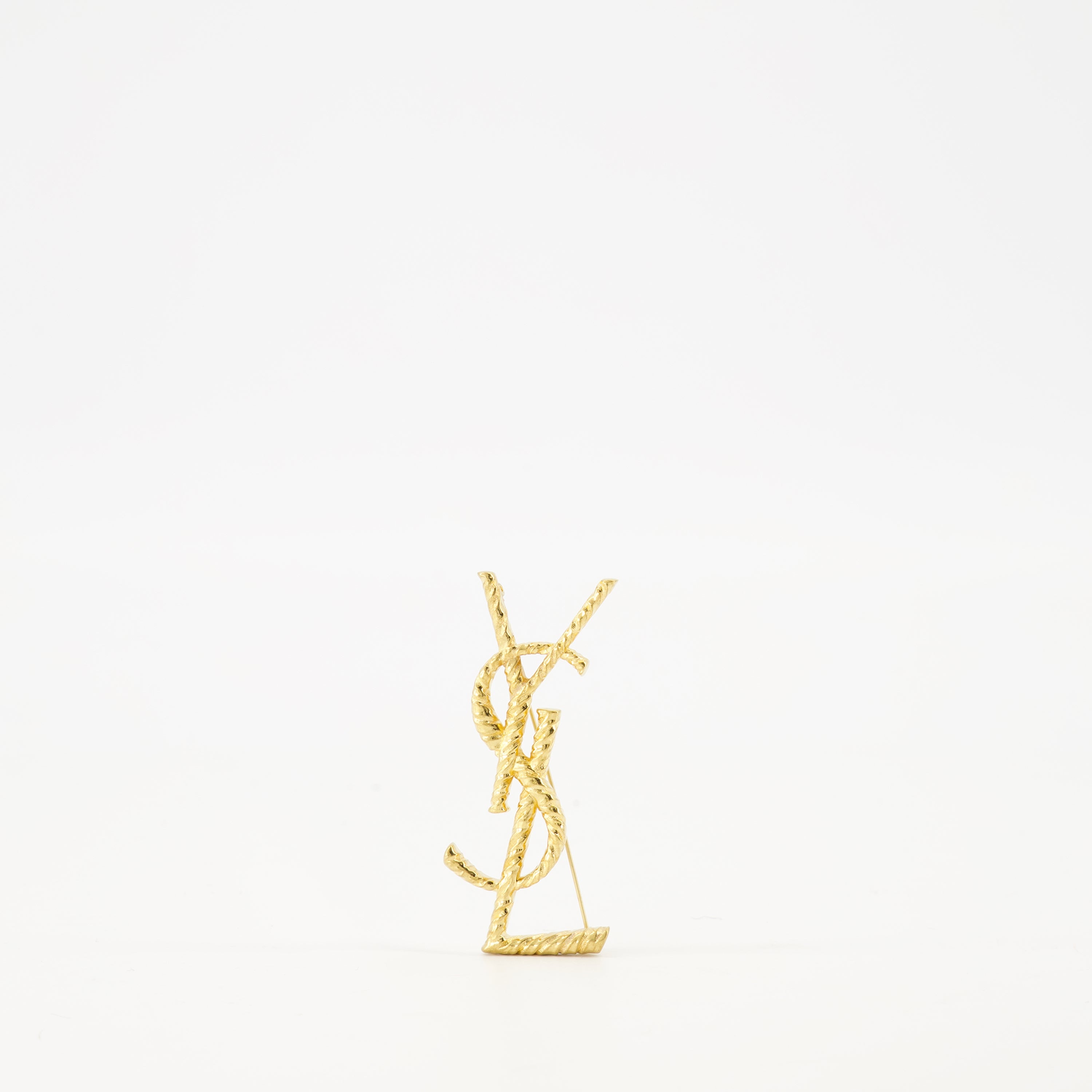 Cassandre brooch, Saint Laurent accessory, gold brooch, metal logo, fashion jewelry