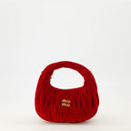 Image du sac en velours matelassé Wander Mini de Miu Miu pour femmes - Saison Printemps-Été 2026 - Vue de face