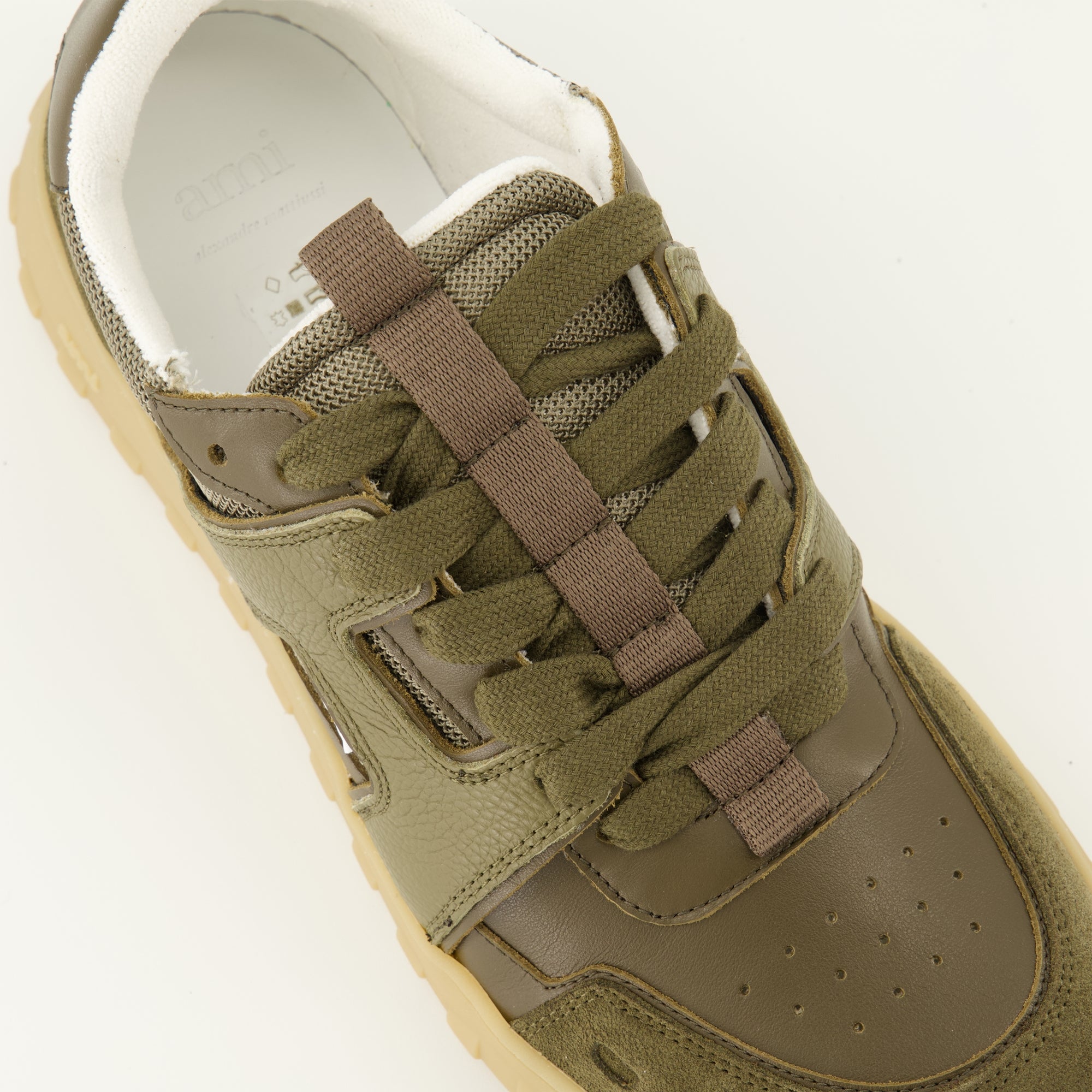 AMI Paris sneakers, Kaki sneakers, unisex footwear, contemporary fashion, leather and suede shoes