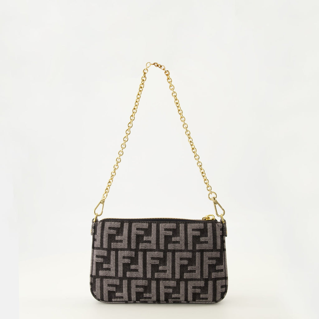 Fendi denim pouch, designer accessories, luxury bags, high-end fashion, autumn-winter collection 2025