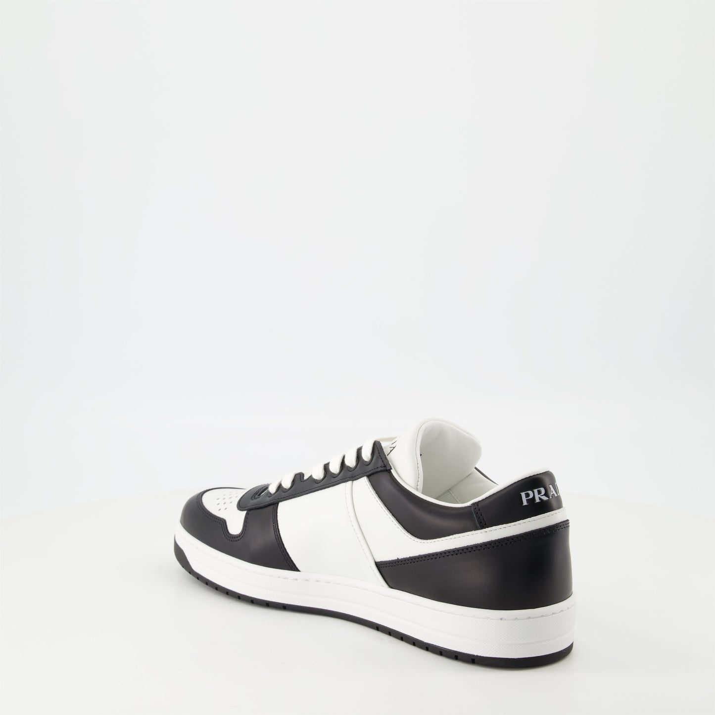 leather sneakers, black and white, Prada, rubber sole, triangle logo